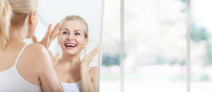 Woman enjoying beautiful facelift results and a refreshed facial appearance in Cincinnati, OH